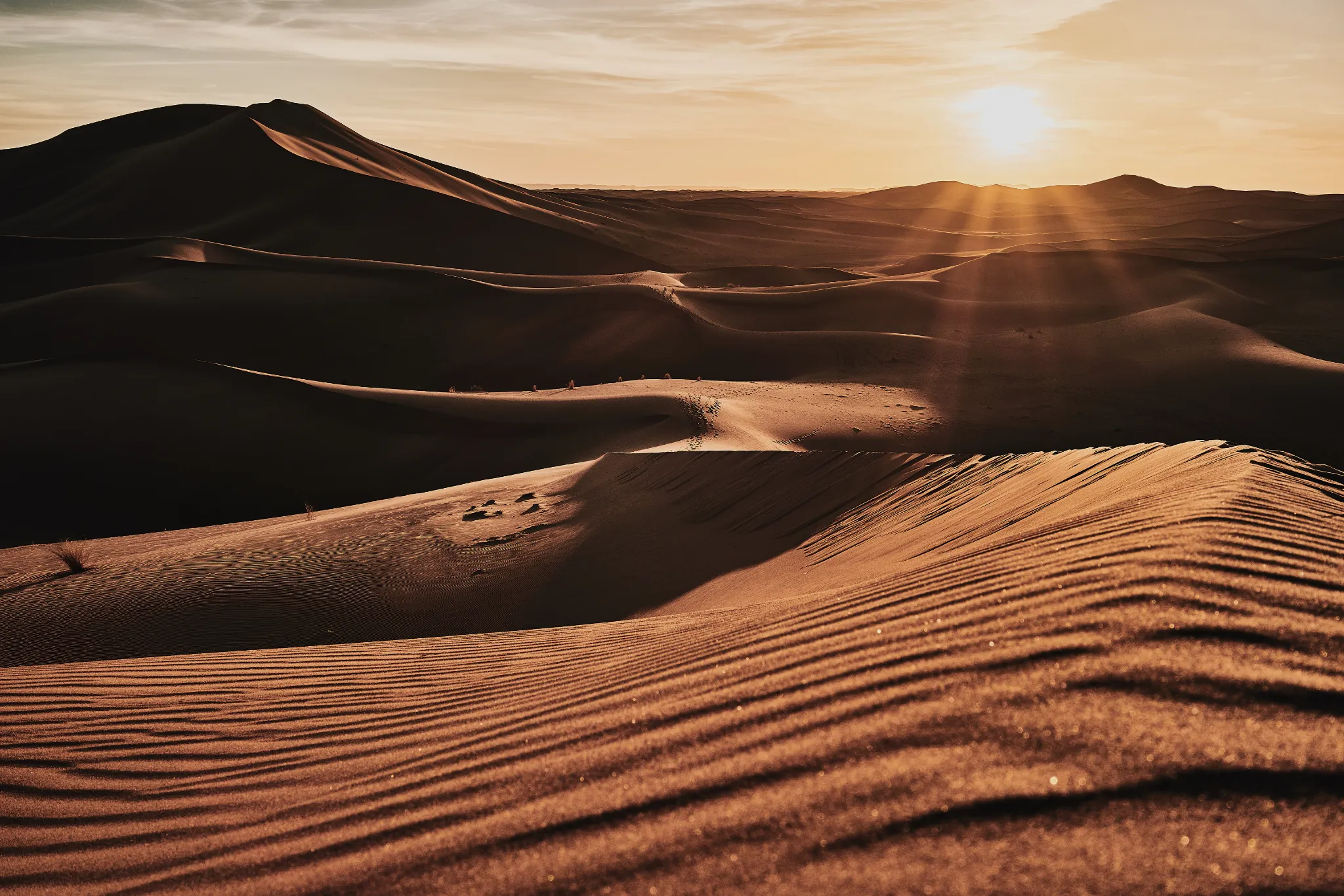 Sunset light across the high dunes of Erg Chegaga in southern Morocco