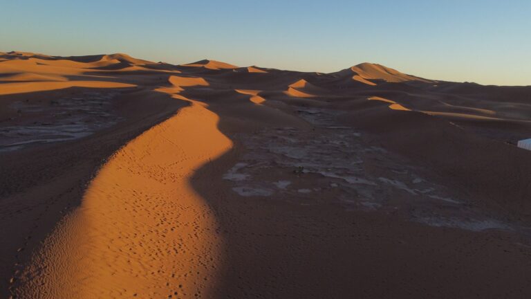 Remote wind-sculpted dunes of Erg Chegaga stretching to the horizon