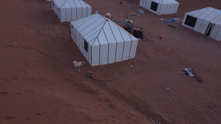 En-suite canvas suites of the Sahara Explore desert camp seen from above